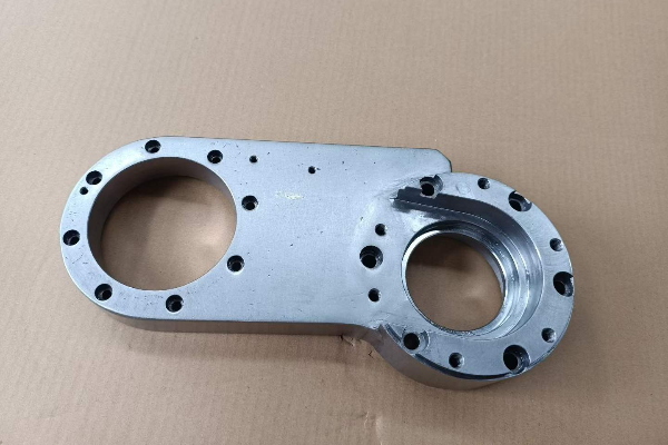 Carbon steel CNC machining component showing precise surface finish and geometry